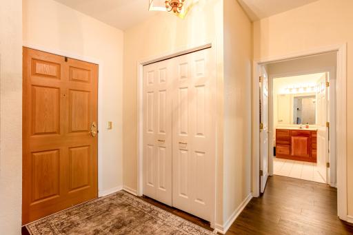Inviting entry welcomes you home with LVP flooring, a spacious coat closet, and easy access to the main living areas.