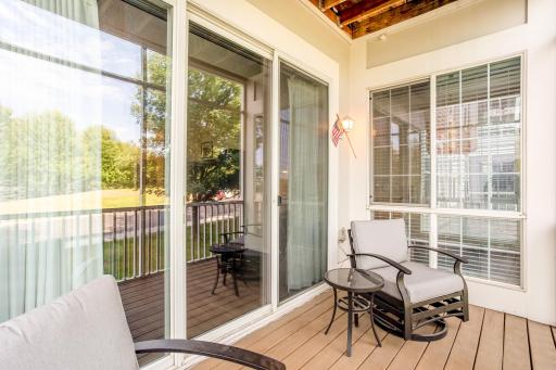 A private screened-in porch provides a comfortable outdoor retreat with convenient access directly from the living room.