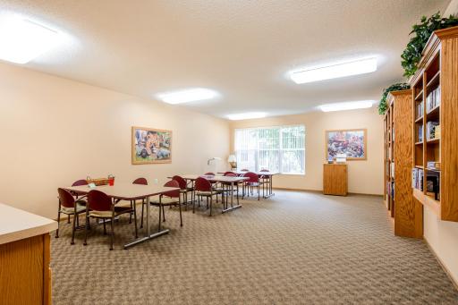 A dedicated puzzle and activity room offers plenty of table space for projects, puzzles, games, and casual get-togethers.