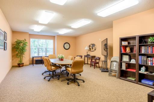 A spacious conference room provides residents with a convenient setting for meetings, group discussions, or other shared activities.