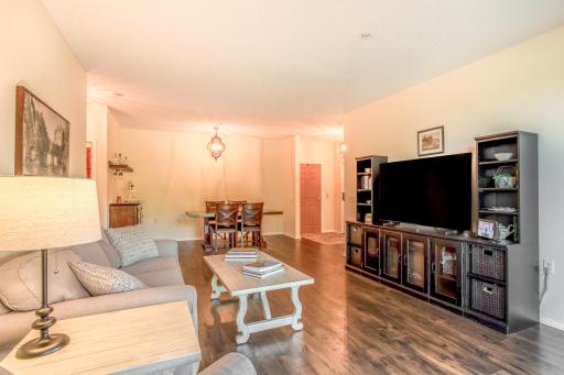 Open living spaces flow seamlessly into the dining area, creating a comfortable and inviting layout.