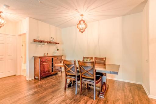 Separate formal dining area provides a spacious setting for meals, entertaining, and special occasions.