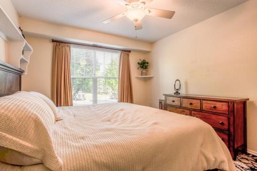 Bright and comfortable primary suite offers plenty of space for additional bedroom furnishings.