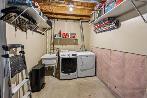 Dedicated laundry room provides convenient functionality.