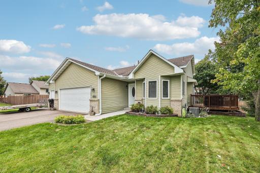 Well-maintained exterior with a spacious front yard.