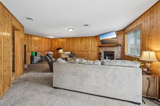 Comfortable lower-level gathering space ideal for relaxing or entertaining.