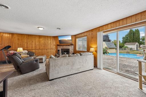 Spacious family room offers additional living space for movie nights, game days, or gatherings.