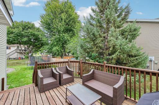 Spacious deck provides an ideal setting for outdoor dining and entertaining.