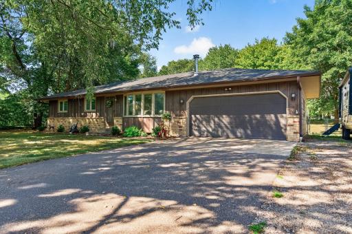 Discover this quiet neighborhood on an acre of land