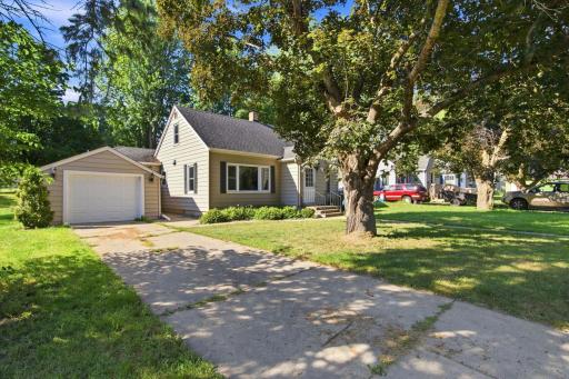 The yard boasts large mature trees perfect for that swing!
