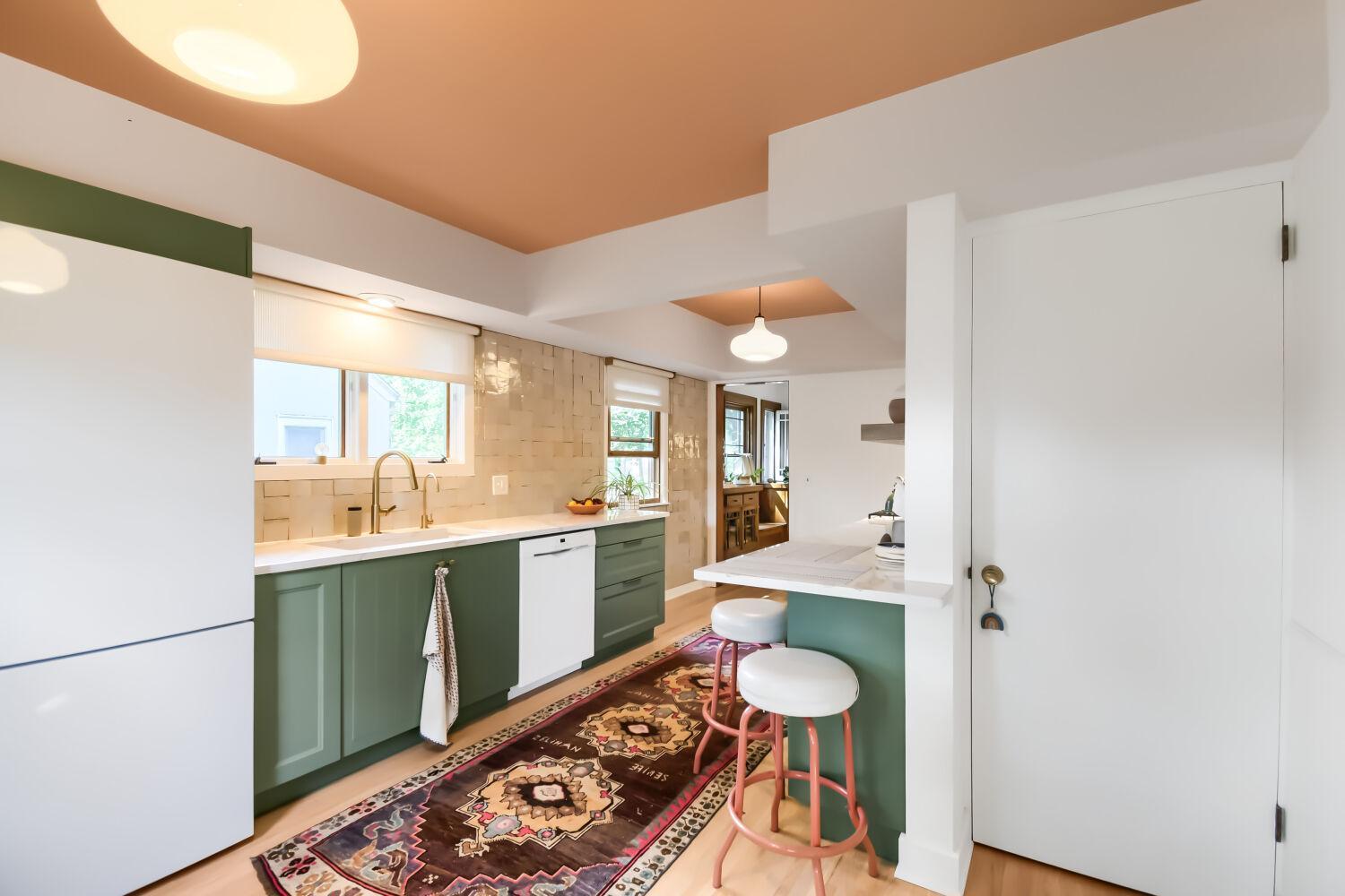 Custom kitchen with lots of countertop space and built in bar seating.