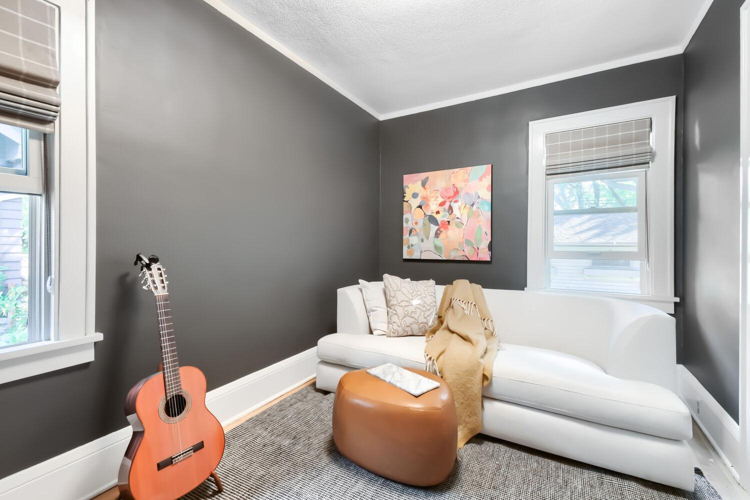 Second main floor bedroom currently used as a family room..jpg