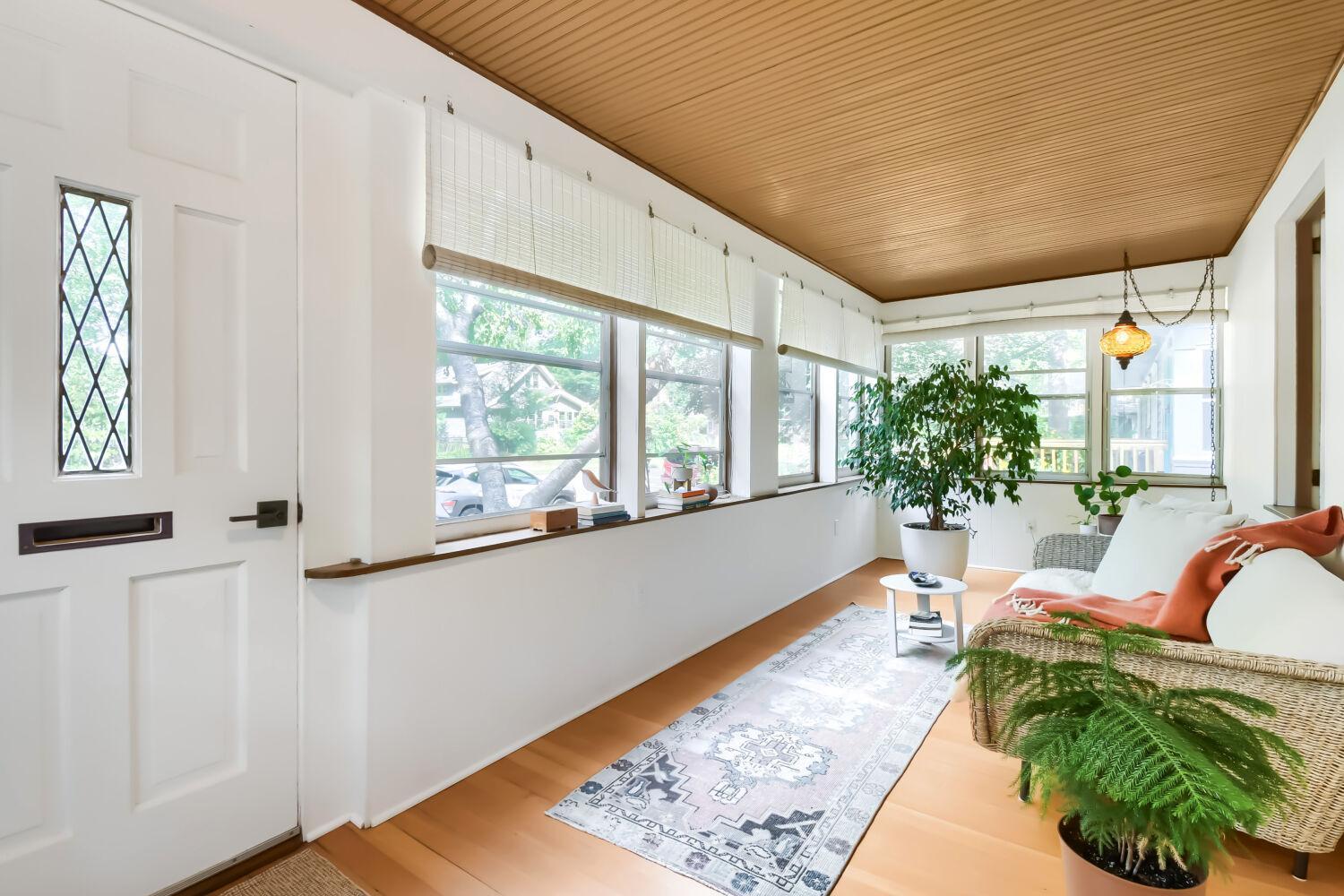 You'll love have your morning coffee on this cozy front porch.