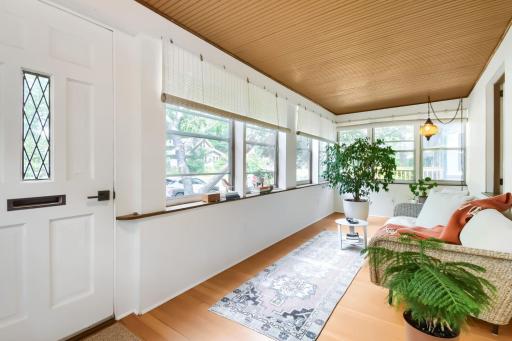 You'll love have your morning coffee on this cozy front porch.