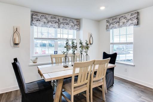 A true dining area flooded with natural light! *Model home, colors and selections will vary.