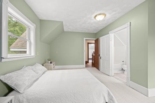 Primary bedroom has fresh paint and carpet.