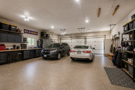 Garage with Cars & Storage virtually staged