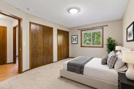 An alternative view of the master suite, showcasing the extensive closet space! *Virtually staged to show design options.