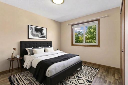 Main level bedroom three. *Virtually staged to show design options.