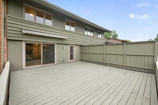 Both the living room and kitchen walk out to the spacious back deck