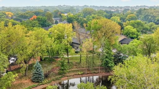 This unit is shaded by mature trees, has beautiful views, and its location makes it feel more private