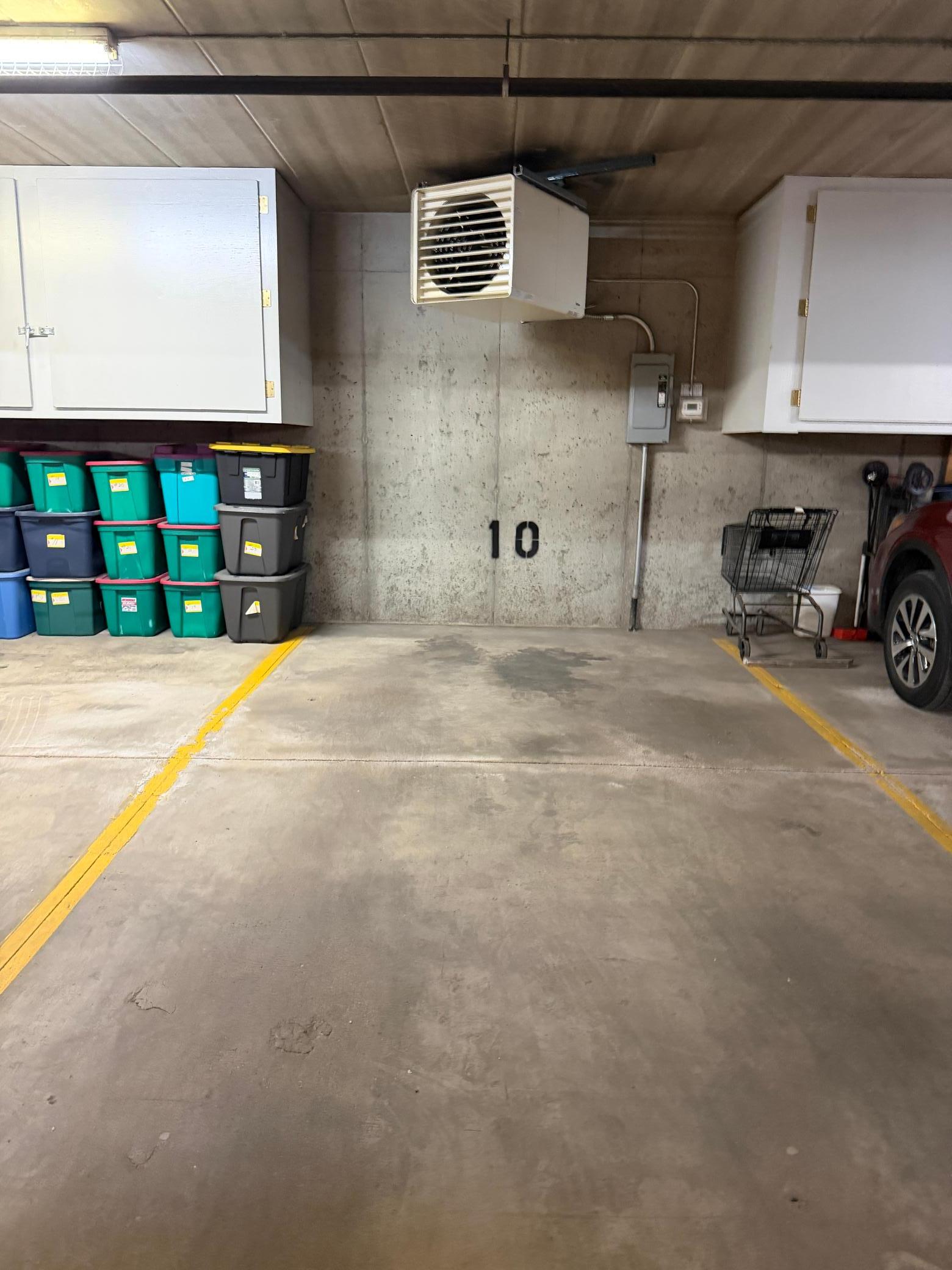 Heated parking garage spot
