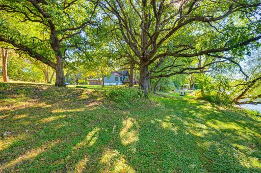 The 1.52 acre lot gently slopes towards the lake.