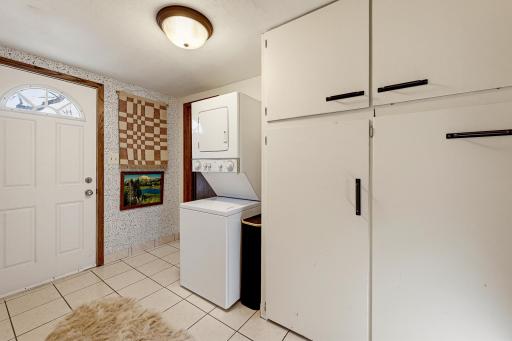 Enjoy the convenience of the laundry room in the entryway.