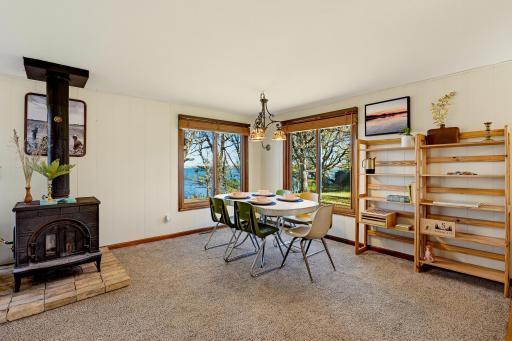 Enjoy views of Clear Lake from your dining table. The wood burning stove provides additional heat.