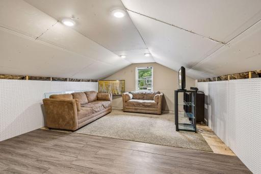 Huge bonus room above the detached garage offers incredible flexibility.