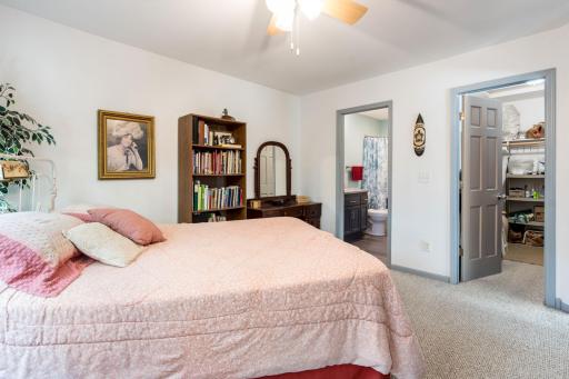 Primary suite with bath and walk-in closet