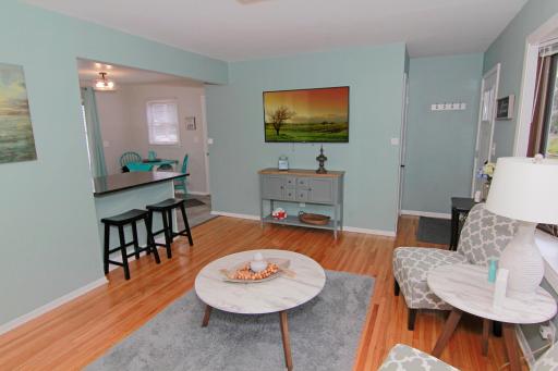 Photo for 5619 Vera Cruz Avenue N, Crystal, MN 55429 - listing #7133895 Living room looking into the open kitchen