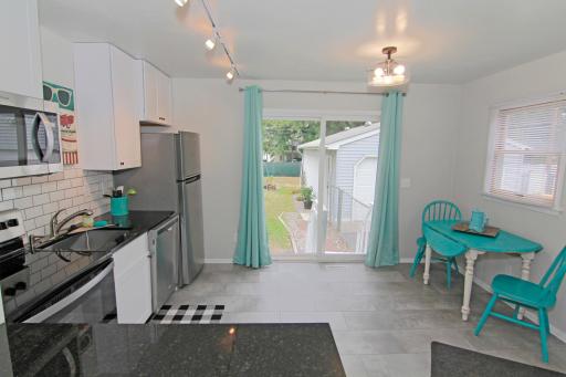 Sliding glass door leading out to the back yard.