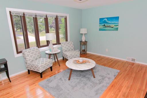 Hardwood floors and bay window in the living room