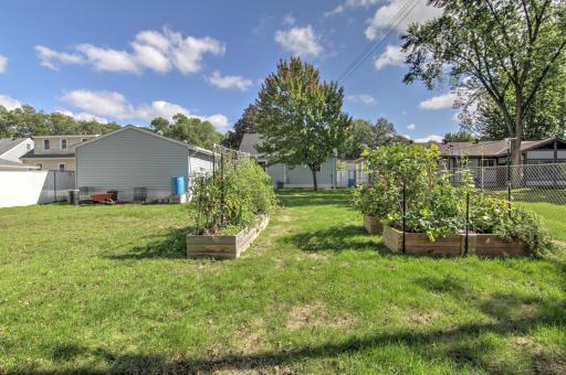 Back yard with lots of sunny space for gardens