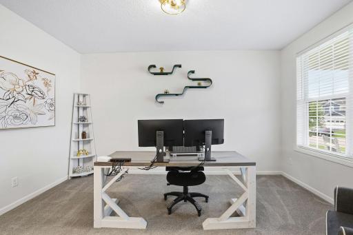 Flex room on main level perfect for a home office!