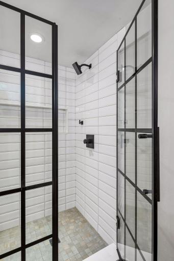Cool shower doors and subway tile