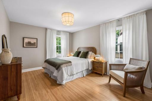 Large primary bedroom in front of house