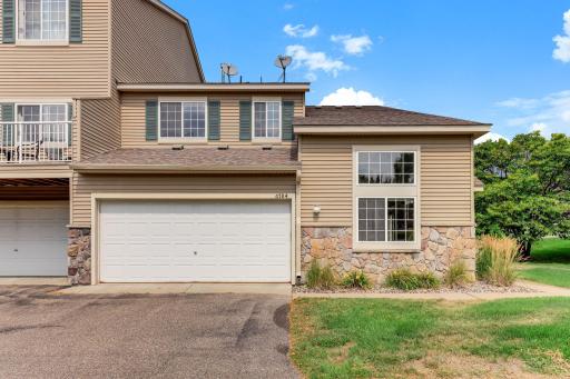 Pull right into the attached two-car garage after a long day. Tidy landscaping and a neutral palette keep the front of the home looking fresh in every season.