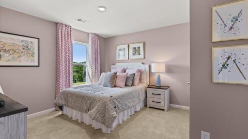 A flexible bedroom that adapts to your needs. Photo of model home, colors and finishes may vary.