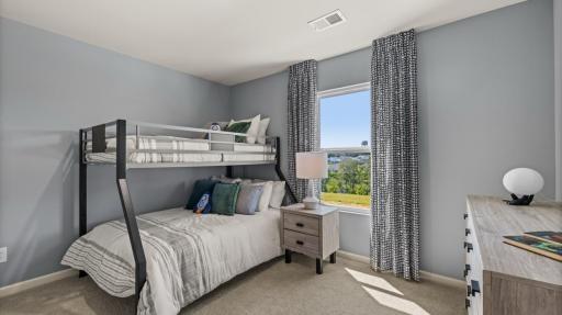 A warm and welcoming bedroom with endless possibilities. Photo of model home, colors and finishes may vary.