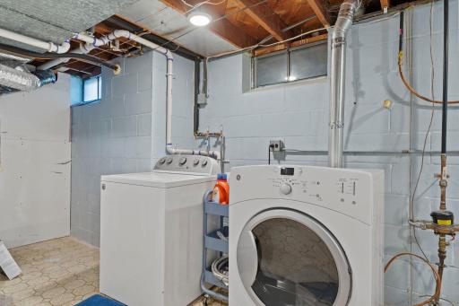Spacious laundry & storage. Radon system installed.