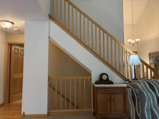 Exceptional staircase with a traditional oak railing.