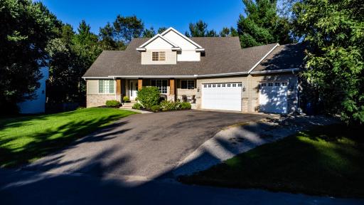 Architectural appeal with the curved off to the side garage for added appeal.