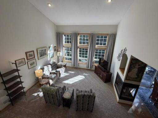Main Floor Living Room with Soaring two story high windows! NEW CARPET!!