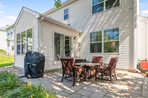 The back patio seamlessly connects indoor & outdoor living.
