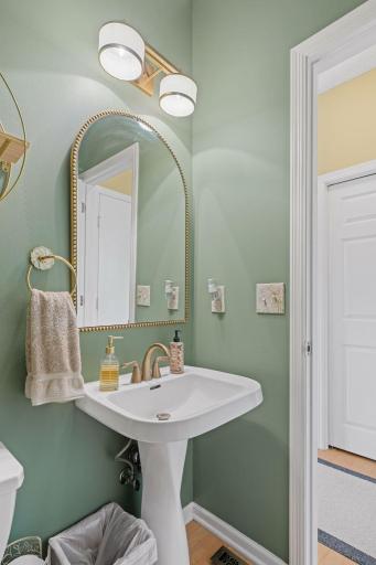 Conveniently located powder room off of the kitchen.