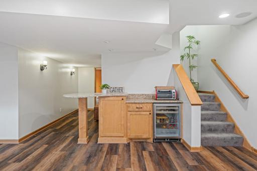 The finish lower level expands your living space and includes a bar!