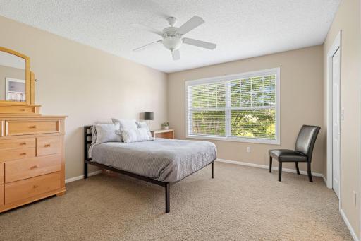 Three additional sizable bedrooms, a full bathroom & laundry room complete the upper level.