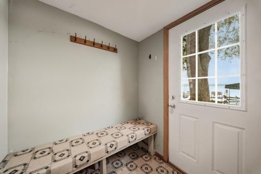 Lower level storage and door out to the lake
